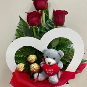 A Valentines Heart Rose Arrangement with Chocolates and Bear